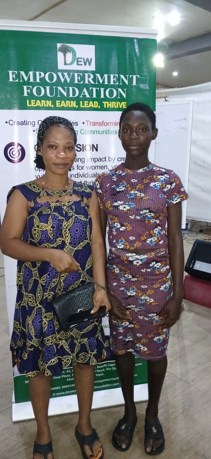 A mother and daughter standing together at the Enterprise Hub